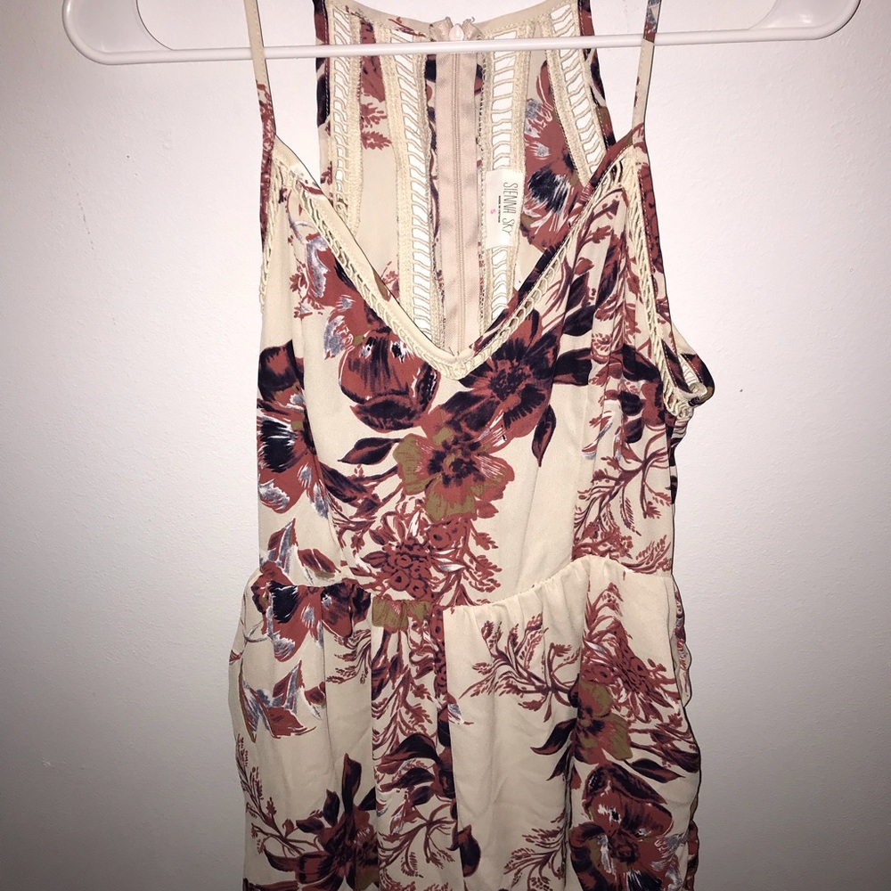 Super cute floral cut out romper